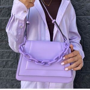 Only worn once lilac purse. Very cute for summer and spacy